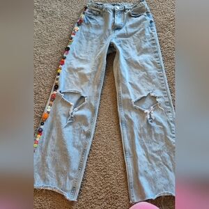 Wide Leg Ripped Jeans With Button Detail!